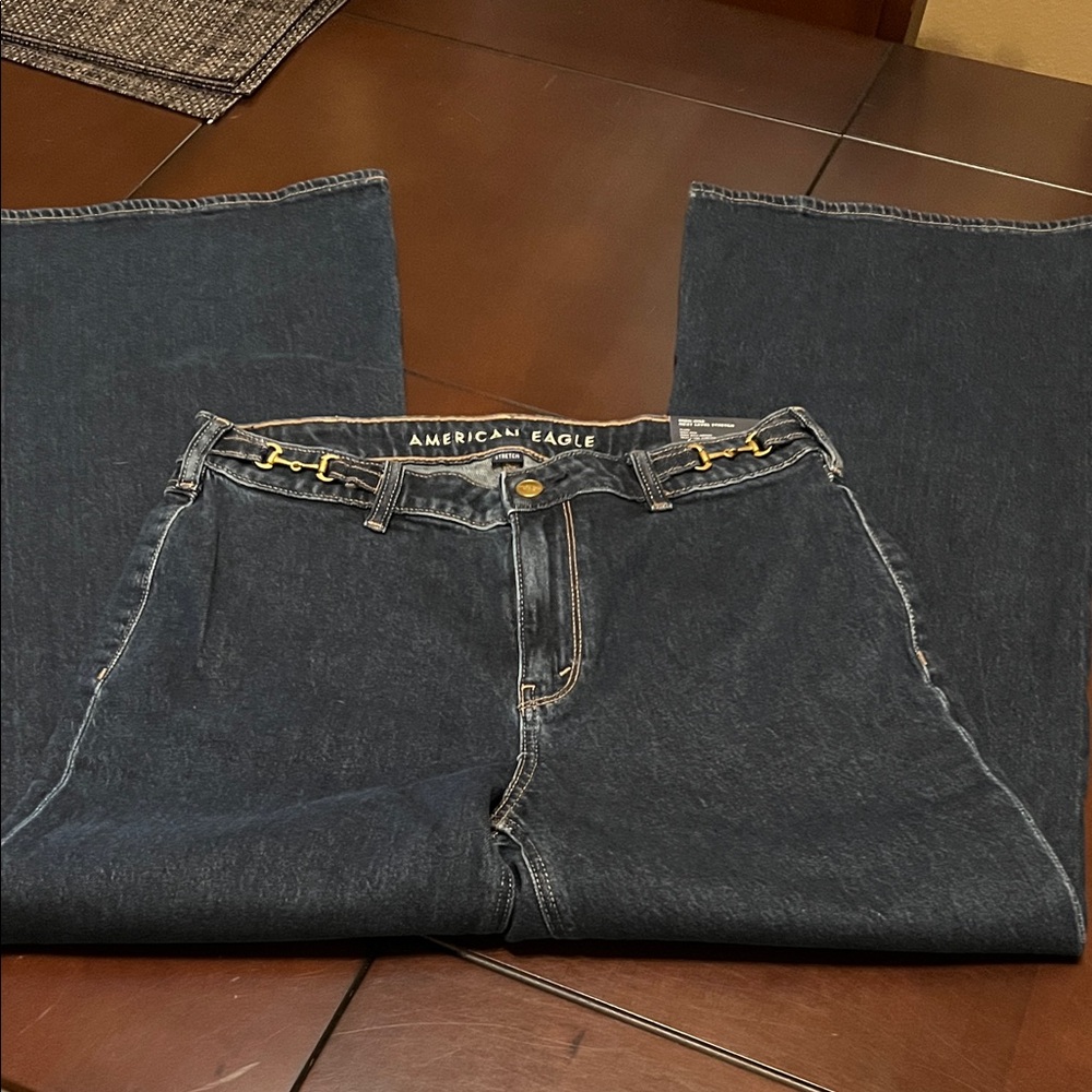American Eagle Outfitters Dark Blue Flare Jeans hole in back top see photo